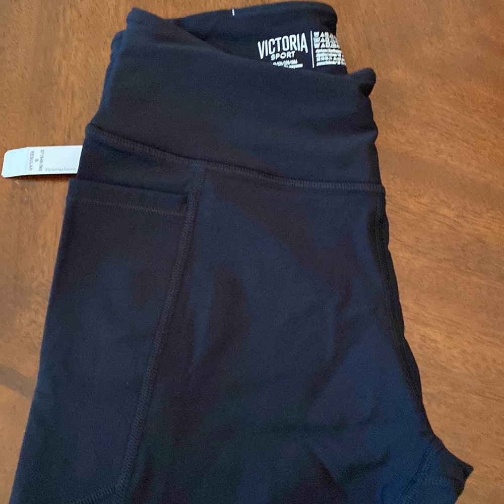 Victoria Secret leggings with pockets on both sides.